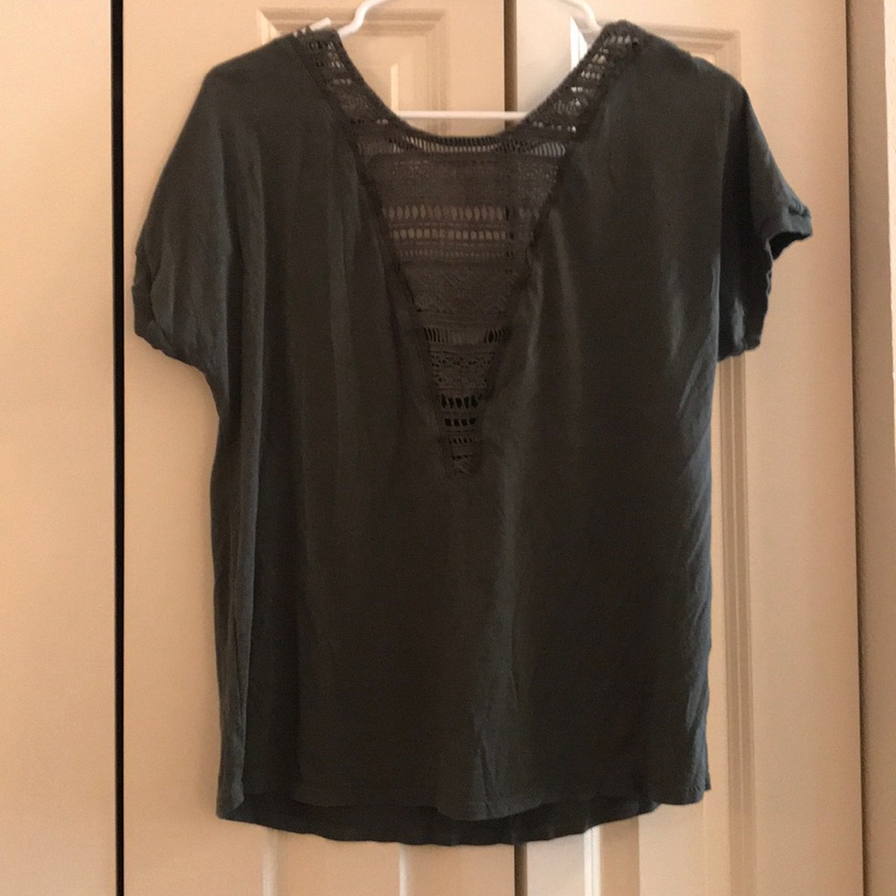 Brand Tiny green top size S, V detailing